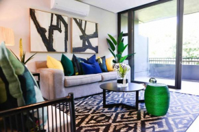 Lush Coastal Condo in a Forest Estate